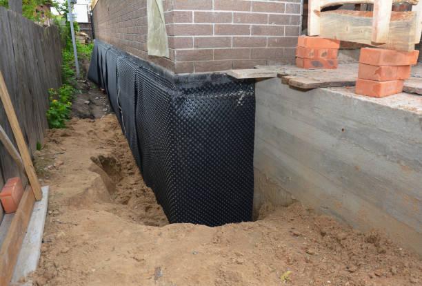 Happy homeowners after waterproofing job in Sidney